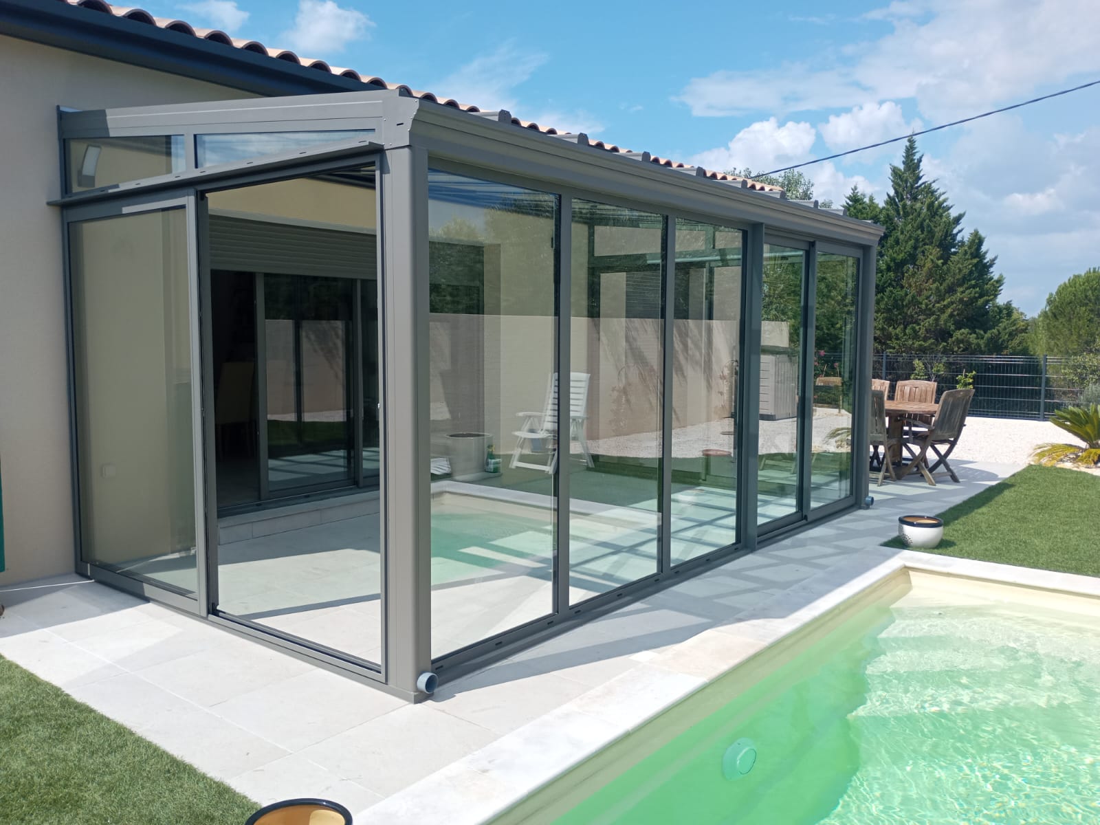 28/07/2025 Pose d une vranda aluminium gris quartz  ALIGNAN DU VENT 34290